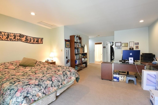 bedroom featuring recessed lighting and light carpet