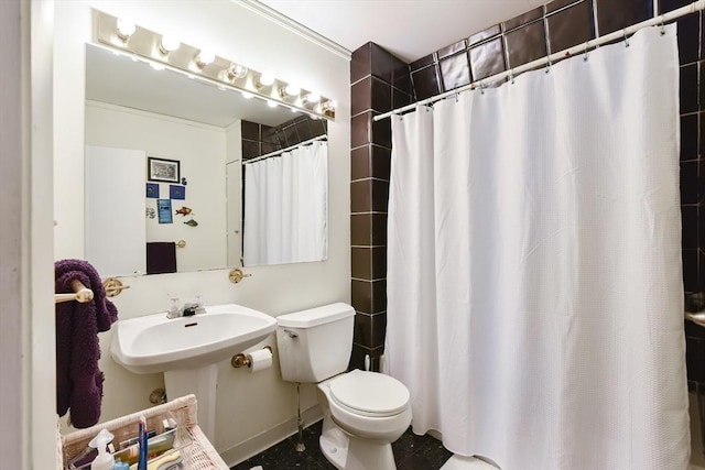 bathroom with a shower with shower curtain and toilet