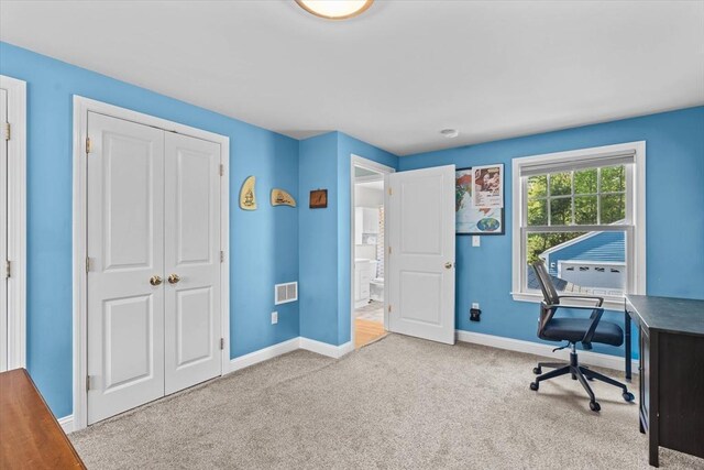 office area featuring carpet and baseboards
