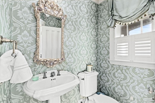 21 Circuit Ave, Scituate, MA 02066 - bathroom with wallpapered walls, a sink, and toilet