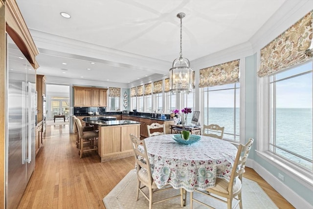 21 Circuit Ave, Scituate, MA 02066 - dining area with ornamental molding, light wood-style flooring, a water view, healthy amount of natural light, and recessed lighting