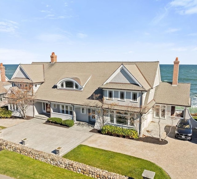 21 Circuit Ave, Scituate, MA 02066 - shingle-style home with a water view, a chimney, and a porch