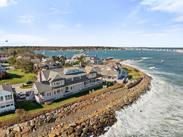 drone / aerial view with a view of the beach and a water view