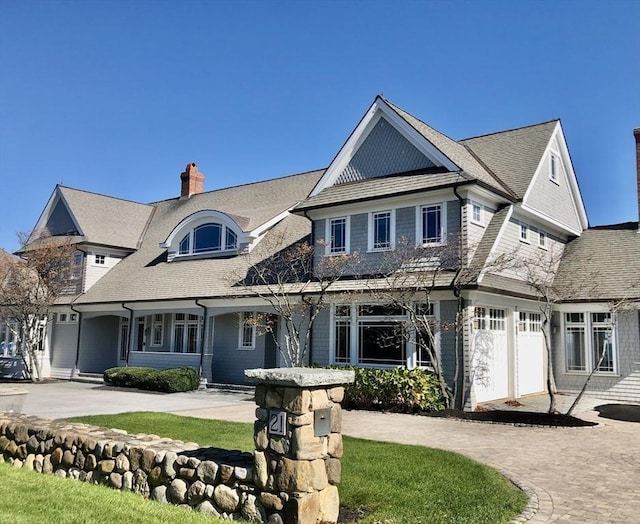 21 Circuit Ave, Scituate, MA 02066 - shingle-style home with a chimney, a porch, and driveway