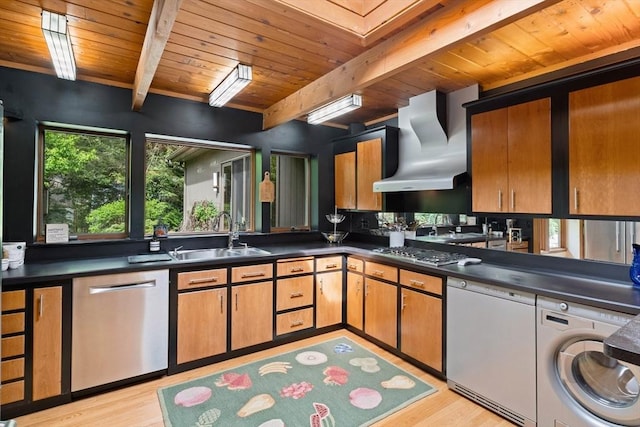 45 Pound St, Medfield, MA 02052 - kitchen with a sink, wall chimney range hood, appliances with stainless steel finishes, washer / dryer, and light wood finished floors