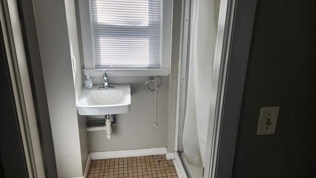 bathroom with baseboards