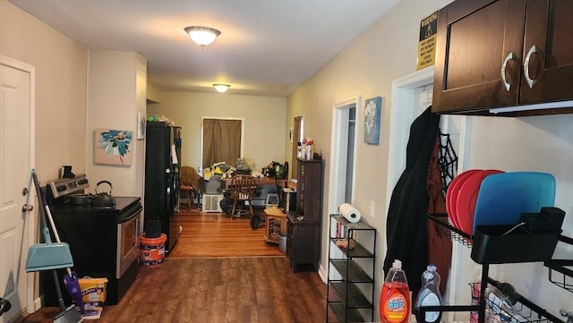 corridor with dark wood finished floors