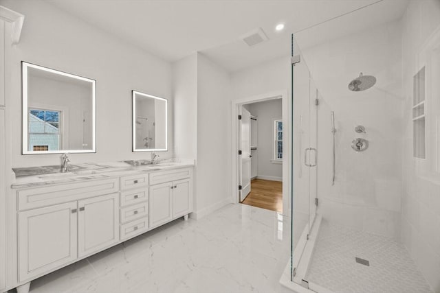 LOT487 Menauhant Rd, Falmouth, MA 02536 - full bath with a stall shower, double vanity, marble finish flooring, baseboards, and recessed lighting