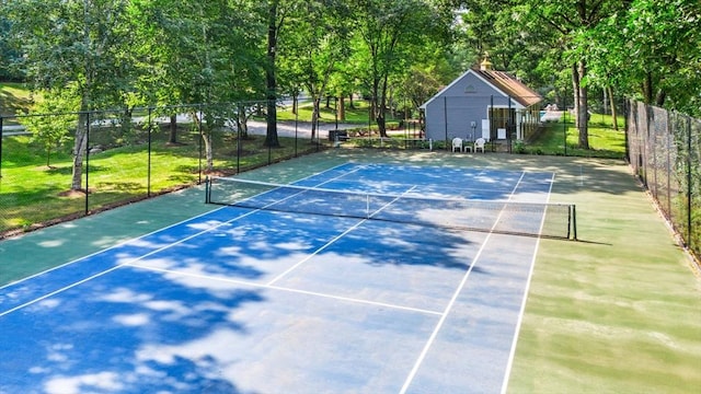 view of sport court with fence