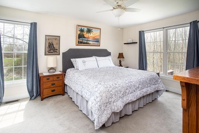 284 Hortonville Rd, Swansea, MA 02777 - bedroom featuring light colored carpet, baseboards, and ceiling fan