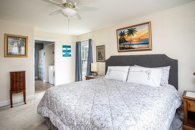 284 Hortonville Rd, Swansea, MA 02777 - bedroom featuring baseboards, washer / dryer, light carpet, ceiling fan, and ensuite bath
