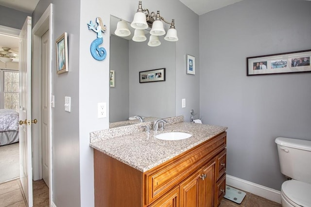 284 Hortonville Rd, Swansea, MA 02777 - bathroom featuring toilet, vanity, baseboards, ensuite bath, and tile patterned floors