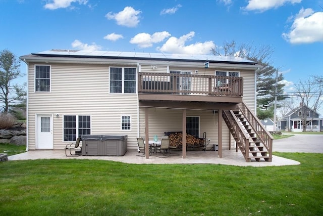 284 Hortonville Rd, Swansea, MA 02777 - back of house with a hot tub, a patio, a deck, and a lawn