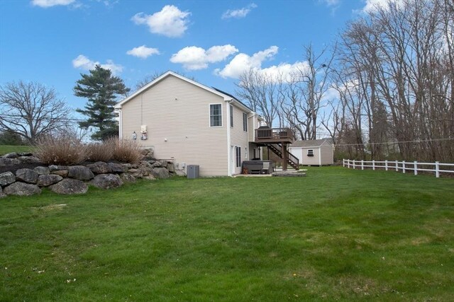 284 Hortonville Rd, Swansea, MA 02777 - view of property exterior with stairs, a deck, an outdoor structure, and a storage unit