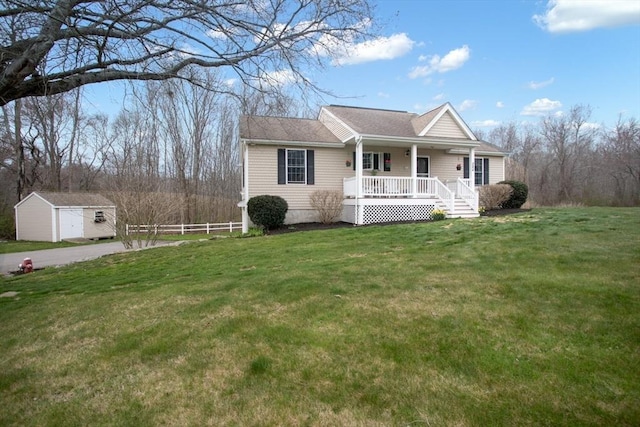 284 Hortonville Rd, Swansea, MA 02777 - view of front of house with a porch, an outdoor structure, and a shed