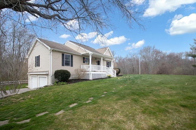 284 Hortonville Rd, Swansea, MA 02777 - view of front of house with covered porch, a garage, a front yard, and driveway