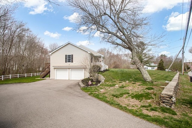 284 Hortonville Rd, Swansea, MA 02777 - view of side of home featuring stairway, a garage, and driveway