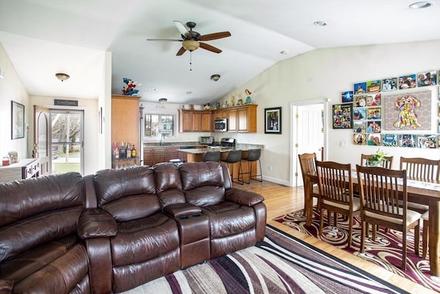 284 Hortonville Rd, Swansea, MA 02777 - living room featuring lofted ceiling, a ceiling fan, light wood finished floors, plenty of natural light, and recessed lighting