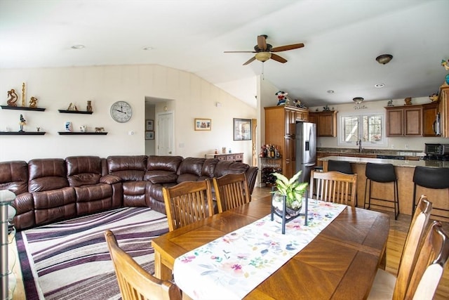 284 Hortonville Rd, Swansea, MA 02777 - dining space with a ceiling fan, lofted ceiling, and light wood finished floors