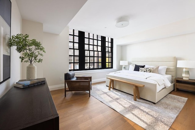 bedroom with wood-type flooring