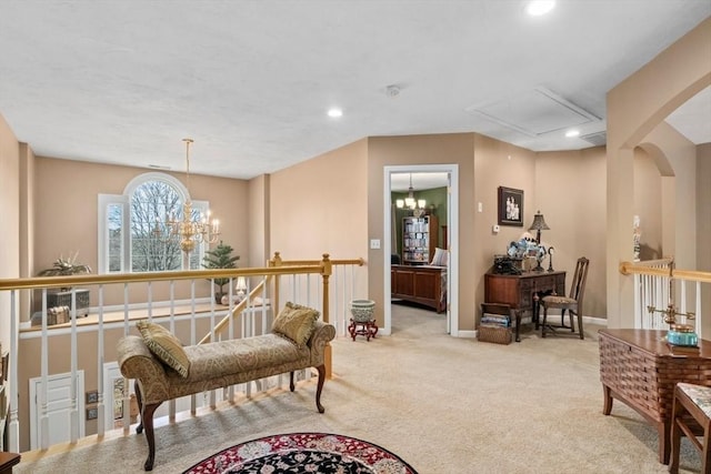 living area with a chandelier, recessed lighting, light colored carpet, and baseboards