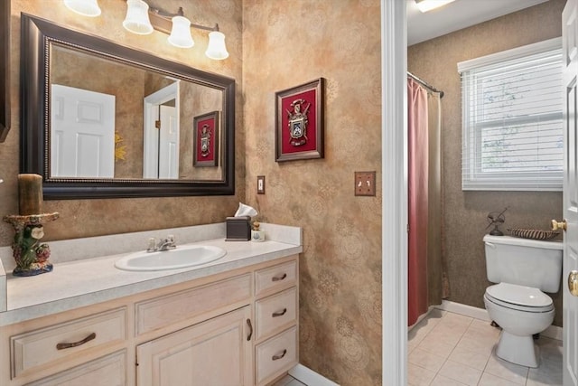 full bathroom featuring baseboards, toilet, a shower with curtain, tile patterned floors, and vanity