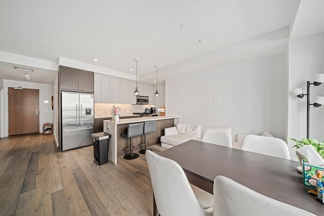 375 Canal St Unit 1109, Somerville, MA 02145 - dining area featuring wood finished floors and recessed lighting