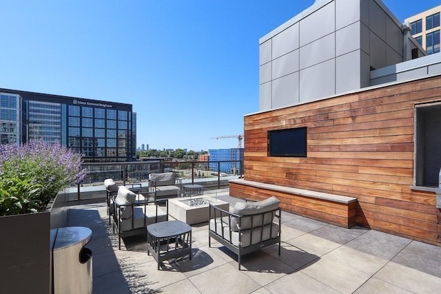 375 Canal St Unit 1109, Somerville, MA 02145 - view of patio / terrace with an outdoor living space with a fire pit and a view of city