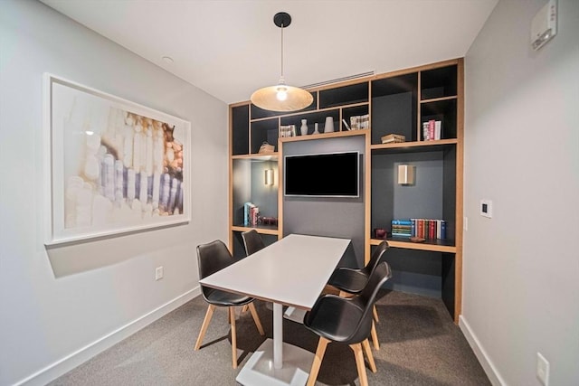 375 Canal St Unit 1109, Somerville, MA 02145 - dining area with carpet flooring, a desk, and built in features