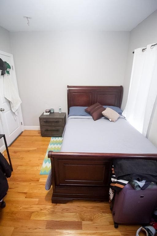 bedroom featuring wood-type flooring