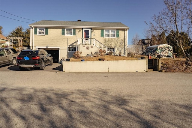 ranch-style home with a garage