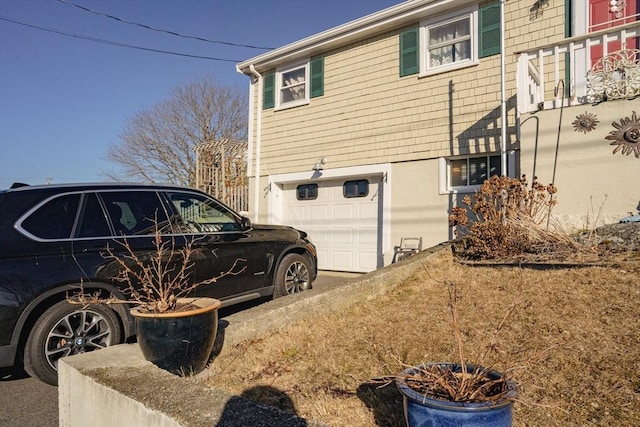 view of home's exterior with a garage