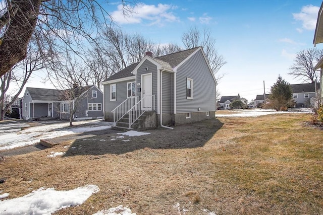 view of front of home with a front yard