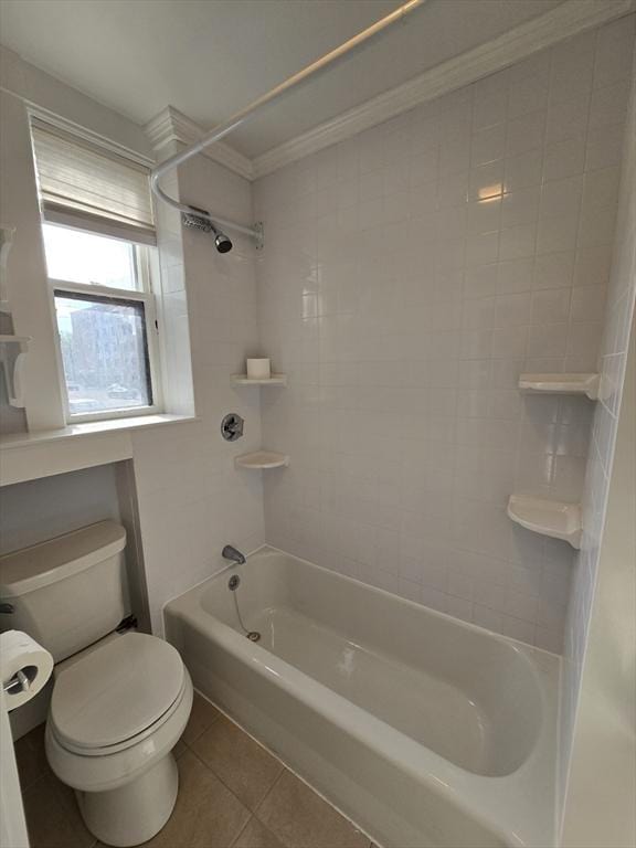 full bath with tile patterned flooring, toilet, shower / bathtub combination, and crown molding