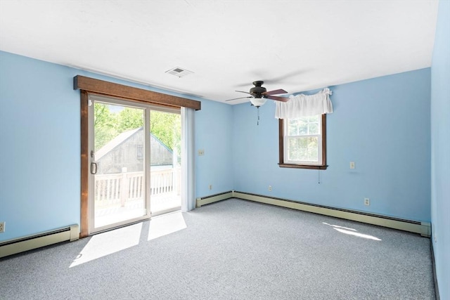 27 Woodland St, Natick, MA 01760 - spare room featuring baseboard heating, ceiling fan, and carpet