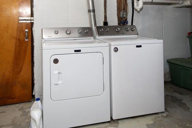 clothes washing area with laundry area and separate washer and dryer