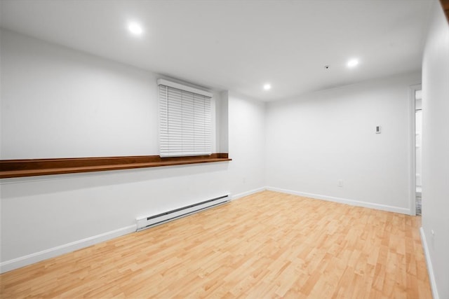 19 Dalrymple St Unit D, Boston, MA 02130 - unfurnished room with baseboard heating, wood finished floors, and recessed lighting