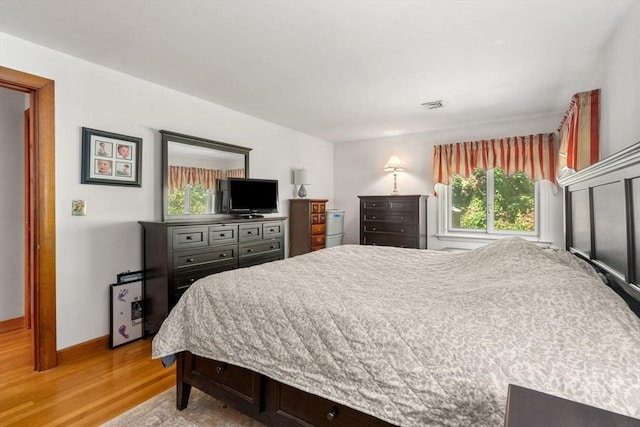 12 Shore Ave, Salem, MA 01970 - bedroom featuring light wood finished floors and multiple windows