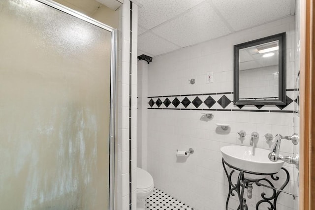 12 Shore Ave, Salem, MA 01970 - bathroom featuring a shower stall, tile walls, and tile patterned flooring