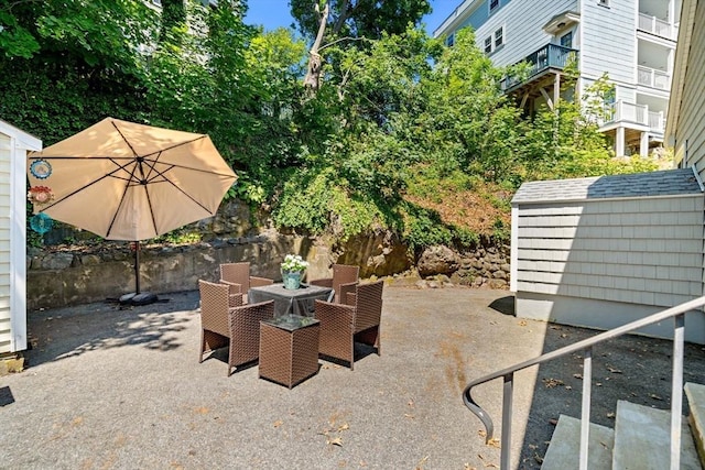 12 Shore Ave, Salem, MA 01970 - view of patio / terrace featuring a storage shed and outdoor dining area