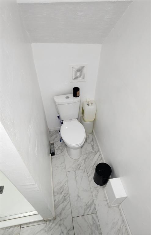 8 Suffield St, Worcester, MA 01610 - bathroom featuring marble finish floors and toilet