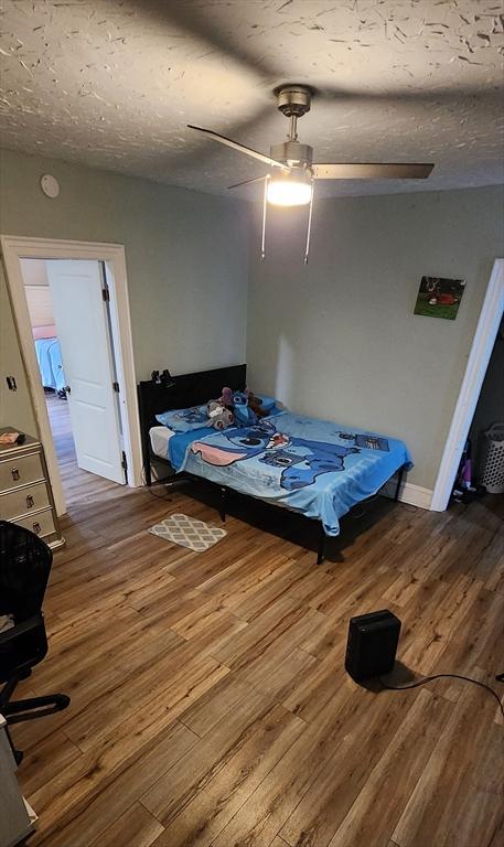 8 Suffield St, Worcester, MA 01610 - bedroom featuring wood finished floors and ceiling fan