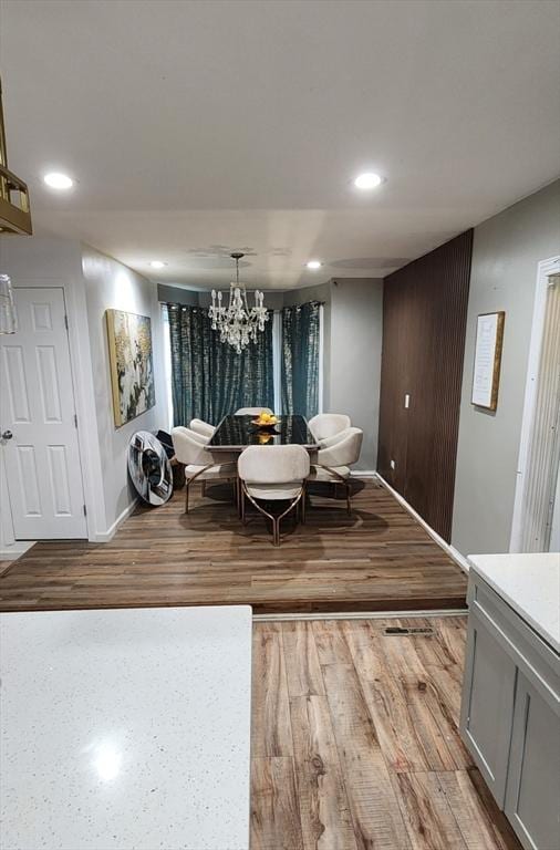 8 Suffield St, Worcester, MA 01610 - dining space with wood finished floors, recessed lighting, baseboards, and a chandelier