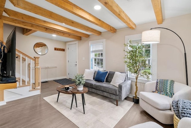 7 Summit Ave, Sharon, MA 02067 - living room with beamed ceiling, wood finished floors, stairway, recessed lighting, and radiator heating unit