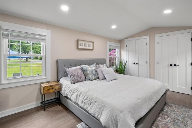 7 Summit Ave, Sharon, MA 02067 - bedroom featuring wood finished floors, two closets, recessed lighting, and vaulted ceiling