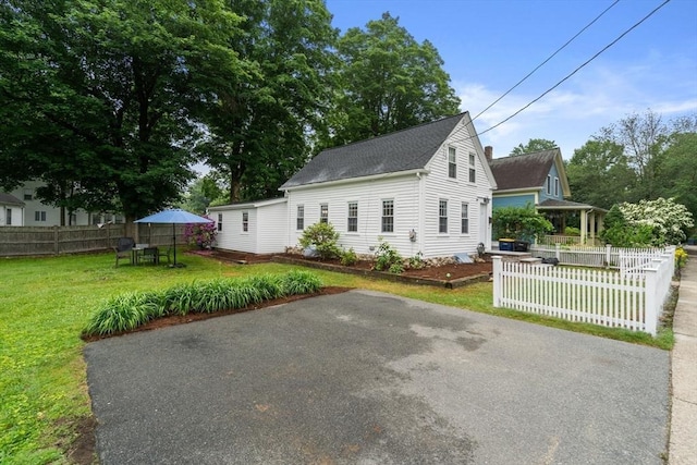 7 Summit Ave, Sharon, MA 02067 - view of home's exterior featuring a patio and a shingled roof