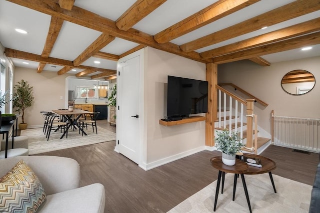 7 Summit Ave, Sharon, MA 02067 - living area featuring wood finished floors, beam ceiling, recessed lighting, and stairs