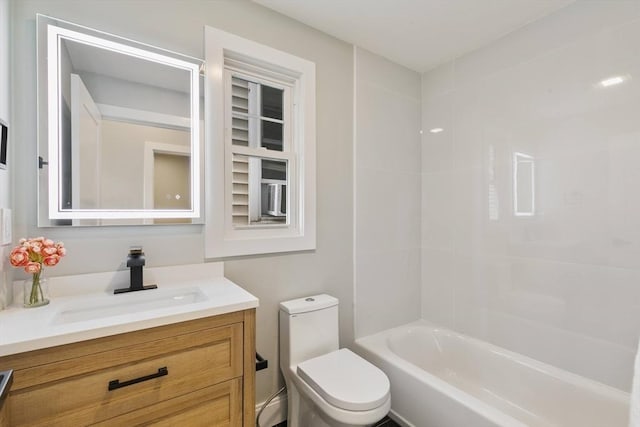 full bathroom featuring shower / tub combination, vanity, and toilet