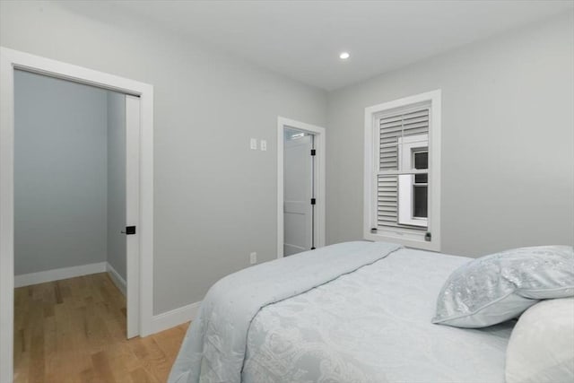 bedroom featuring light hardwood / wood-style flooring