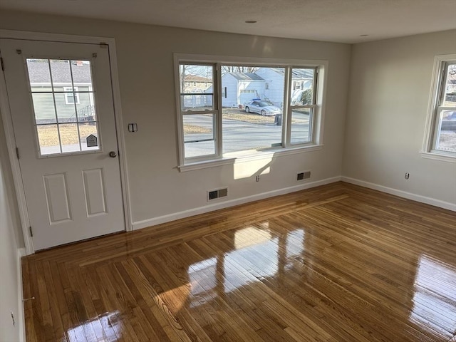 55 Swan St, East Providence, RI 02914 - doorway featuring a wealth of natural light, visible vents, and baseboards